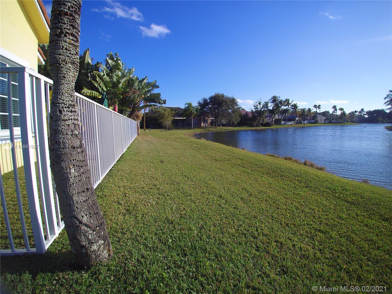 1055 San Luis Rey Weston, FL 33326 - Photo 35 of 36 a view of outdoor space and yard