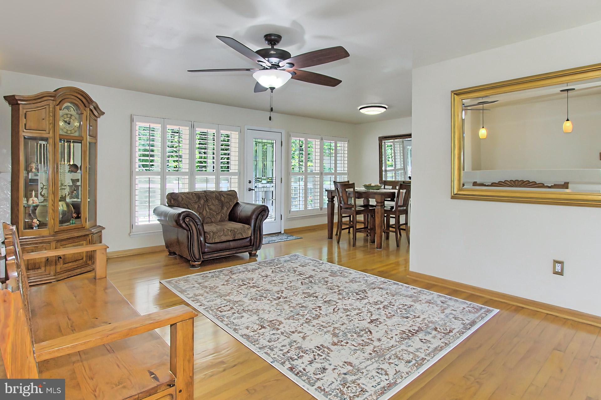 6323 Alberta Street Springfield, VA 22152 - Photo 9 of 63 Plantation shutters in living and dining rooms