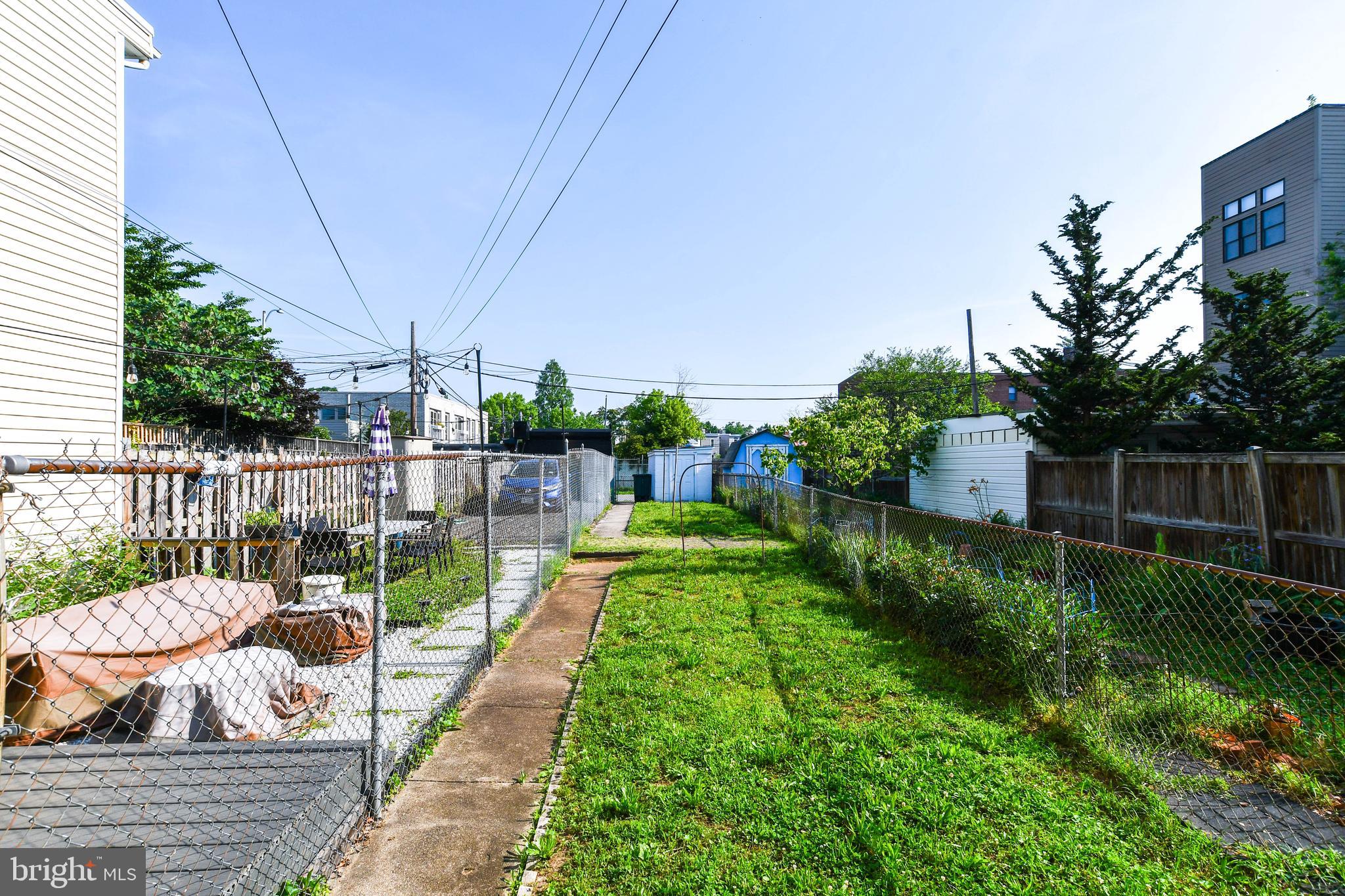 1432 C Street Southeast Washington, DC 20003 - Photo 39 of 48 a view of a backyard with sitting area and garden