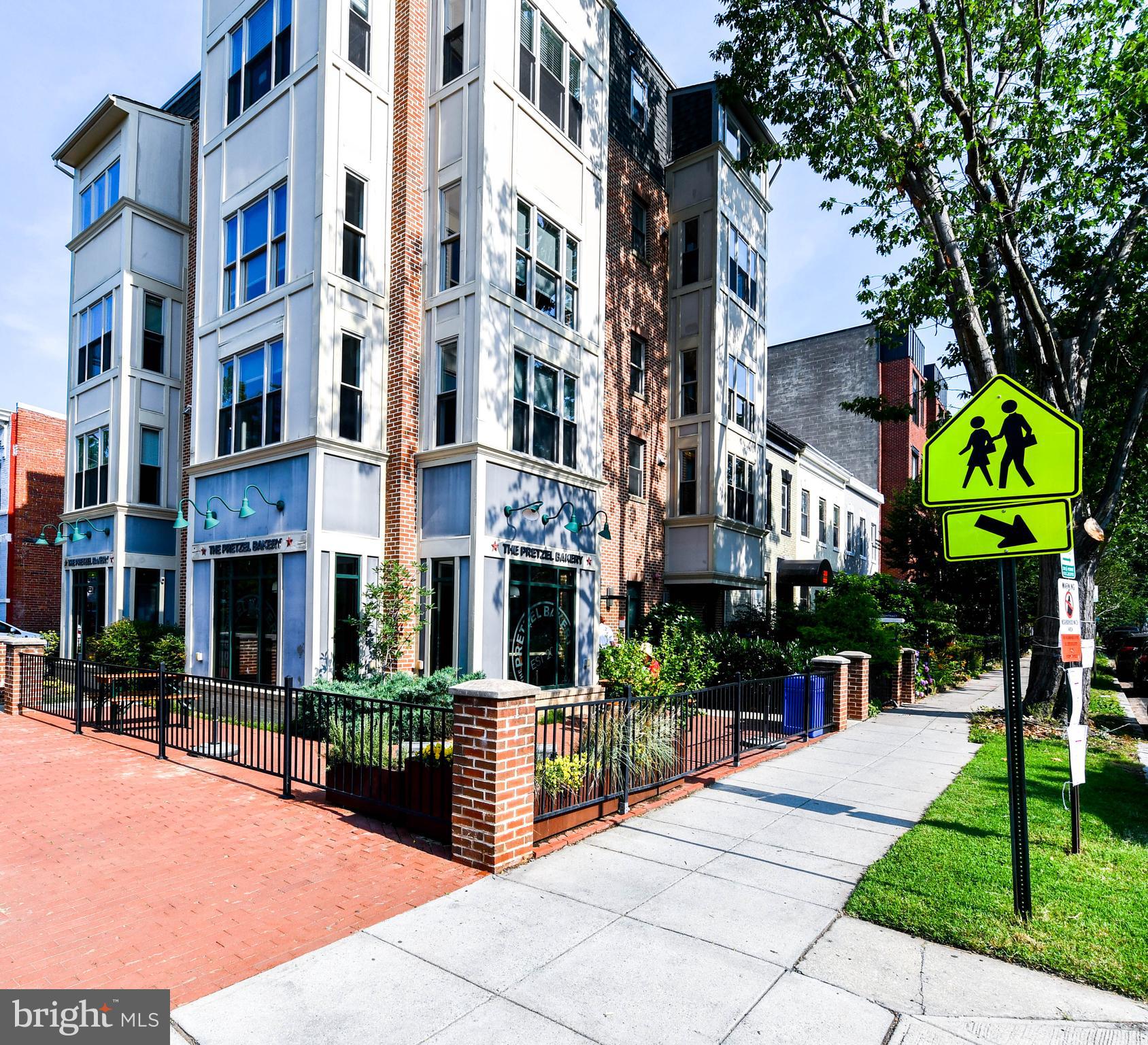 1432 C Street Southeast Washington, DC 20003 - Photo 42 of 48 a street corner with retail shops