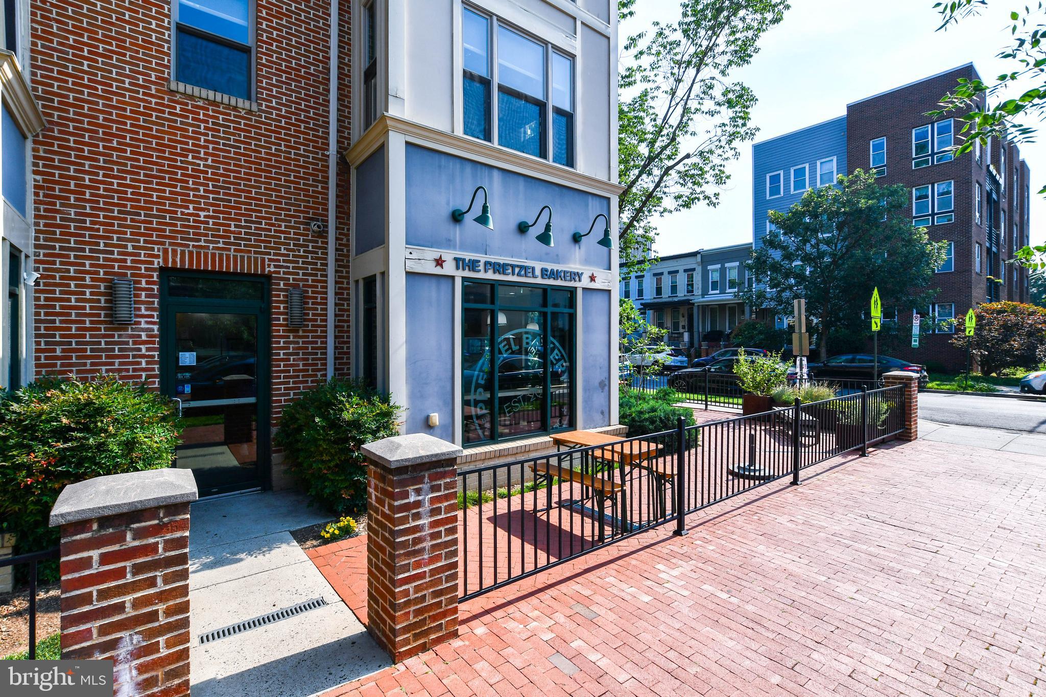 1432 C Street Southeast Washington, DC 20003 - Photo 44 of 48 a balcony with furniture and potted plants