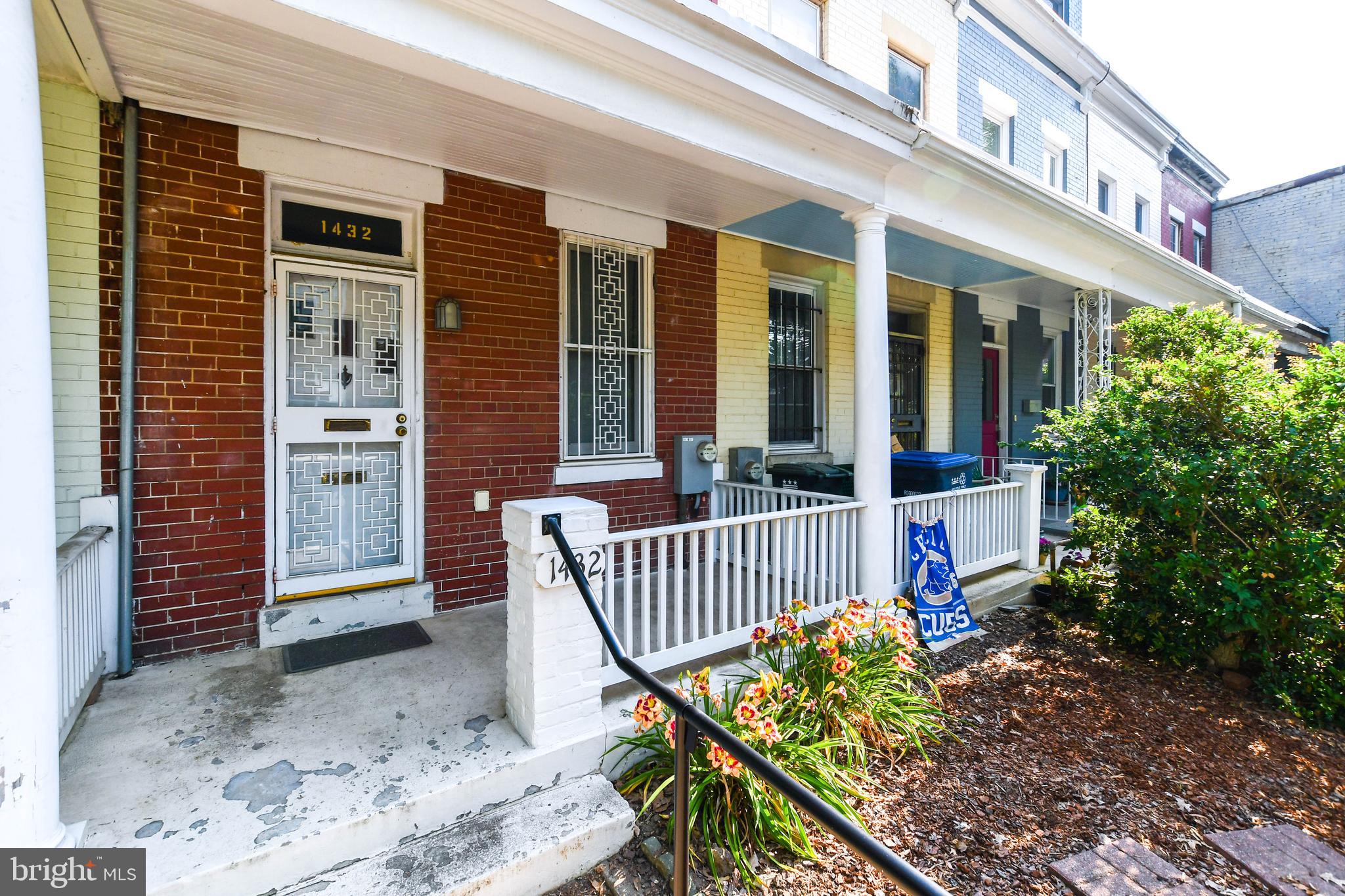1432 C Street Southeast Washington, DC 20003 - Photo 5 of 48 a view of a porch with a bench