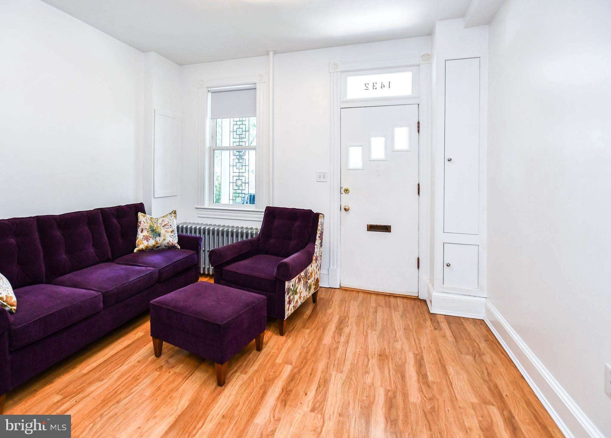 1432 C Street Southeast Washington, DC 20003 - Photo 7 of 48 a living room with furniture and wooden floor