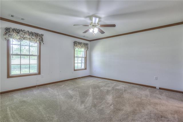 2119 Armstrong Valley Road Murfreesboro, TN 37128 - Photo 14 of 20 an empty room with windows and fan