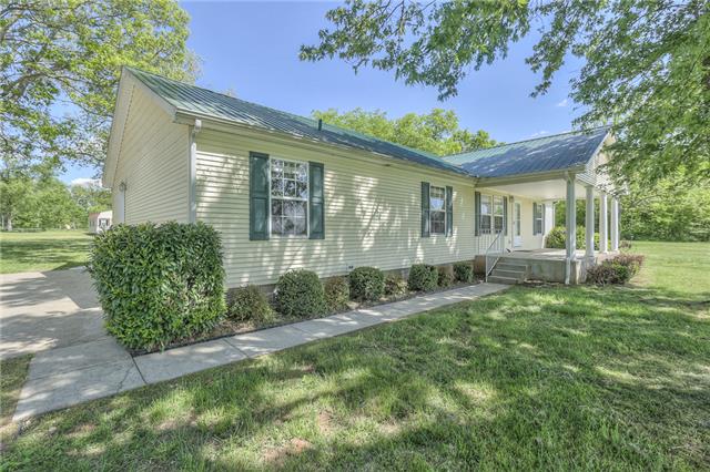2119 Armstrong Valley Road Murfreesboro, TN 37128 - Photo 3 of 20 a front view of a house with garden