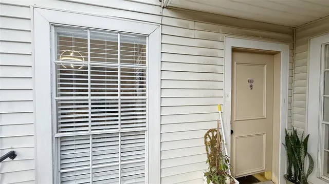 a view of a balcony with a door
