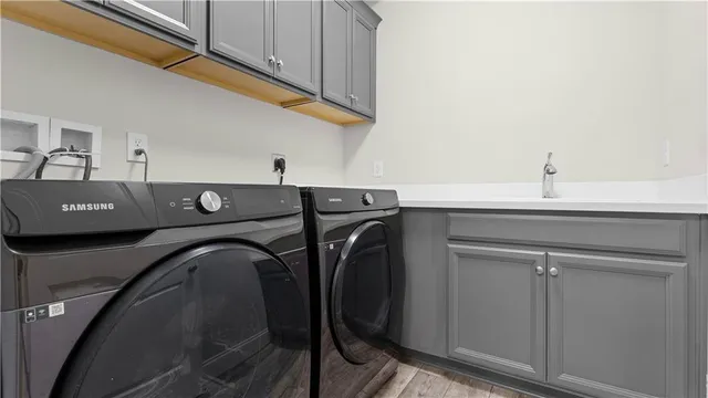 a bathroom with a sink mirror and toilet
