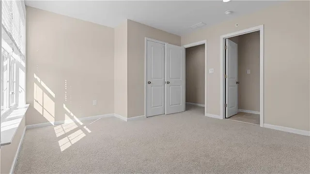 a view of a storage & utility room with stairs