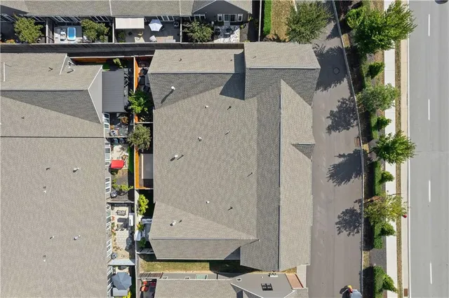 an aerial view of a house with outdoor space