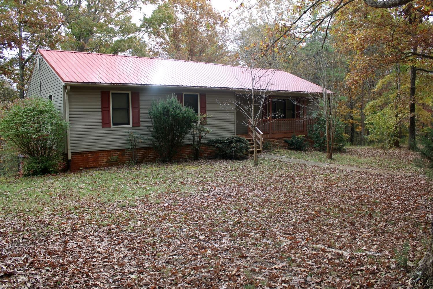 3260 West Perch Road Monroe, VA 24574 - Photo 1 of 12 a view of a house with a yard and sitting area