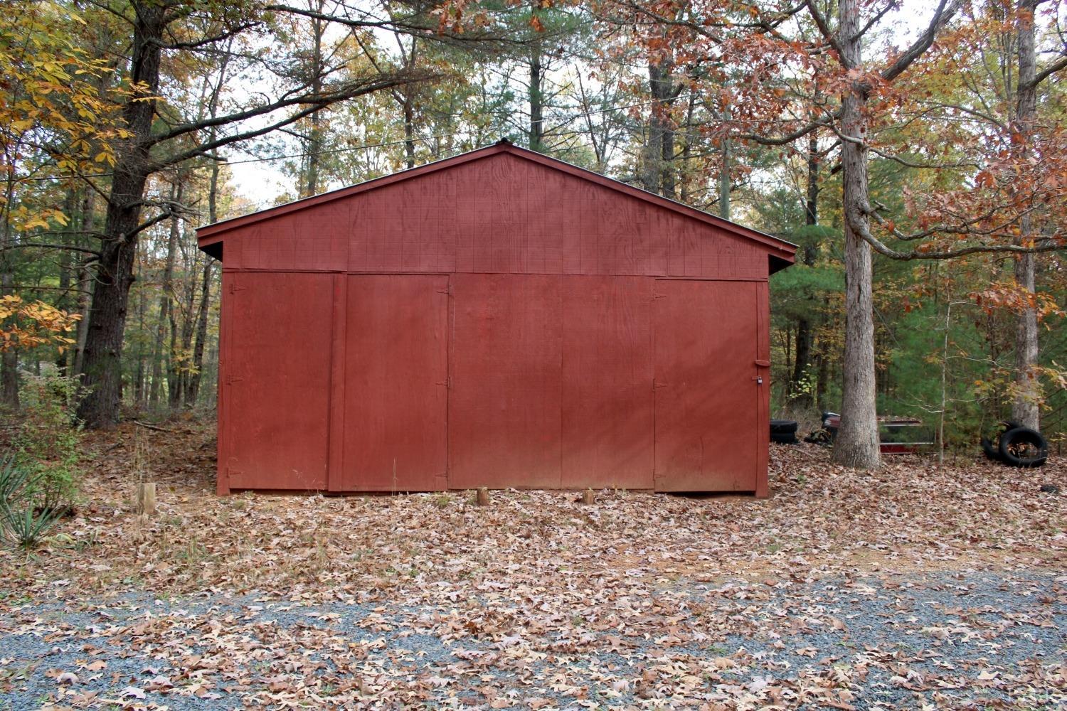 3260 West Perch Road Monroe, VA 24574 - Photo 11 of 12 a view of a small barn with a small yard