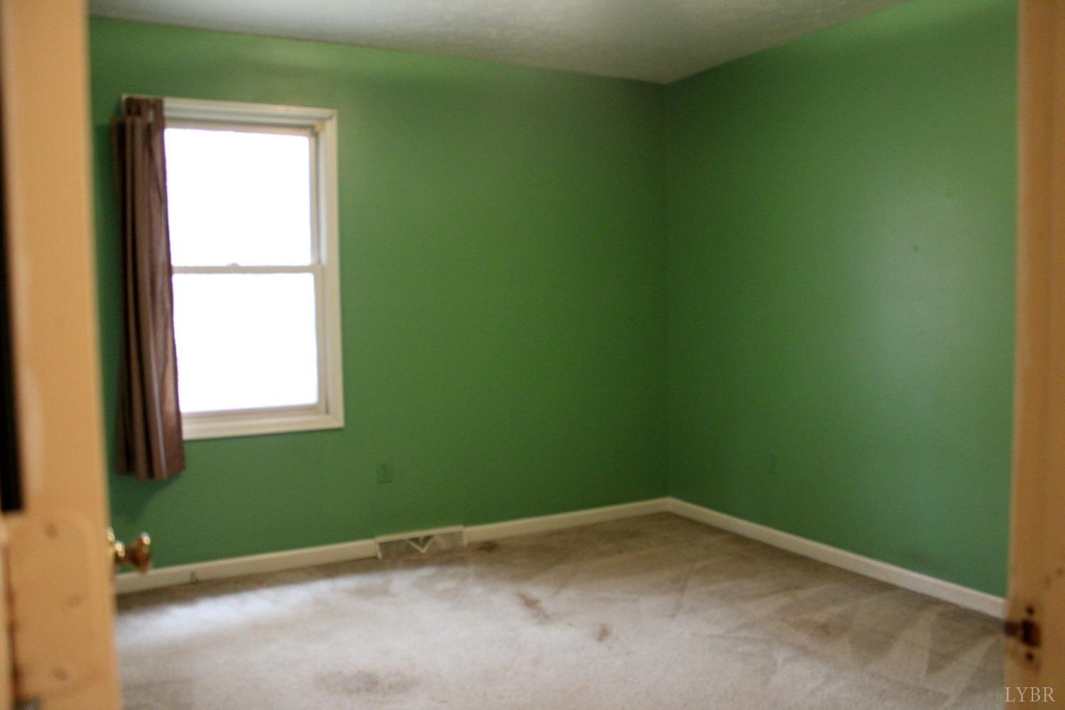 3260 West Perch Road Monroe, VA 24574 - Photo 7 of 12 a view of empty room with window
