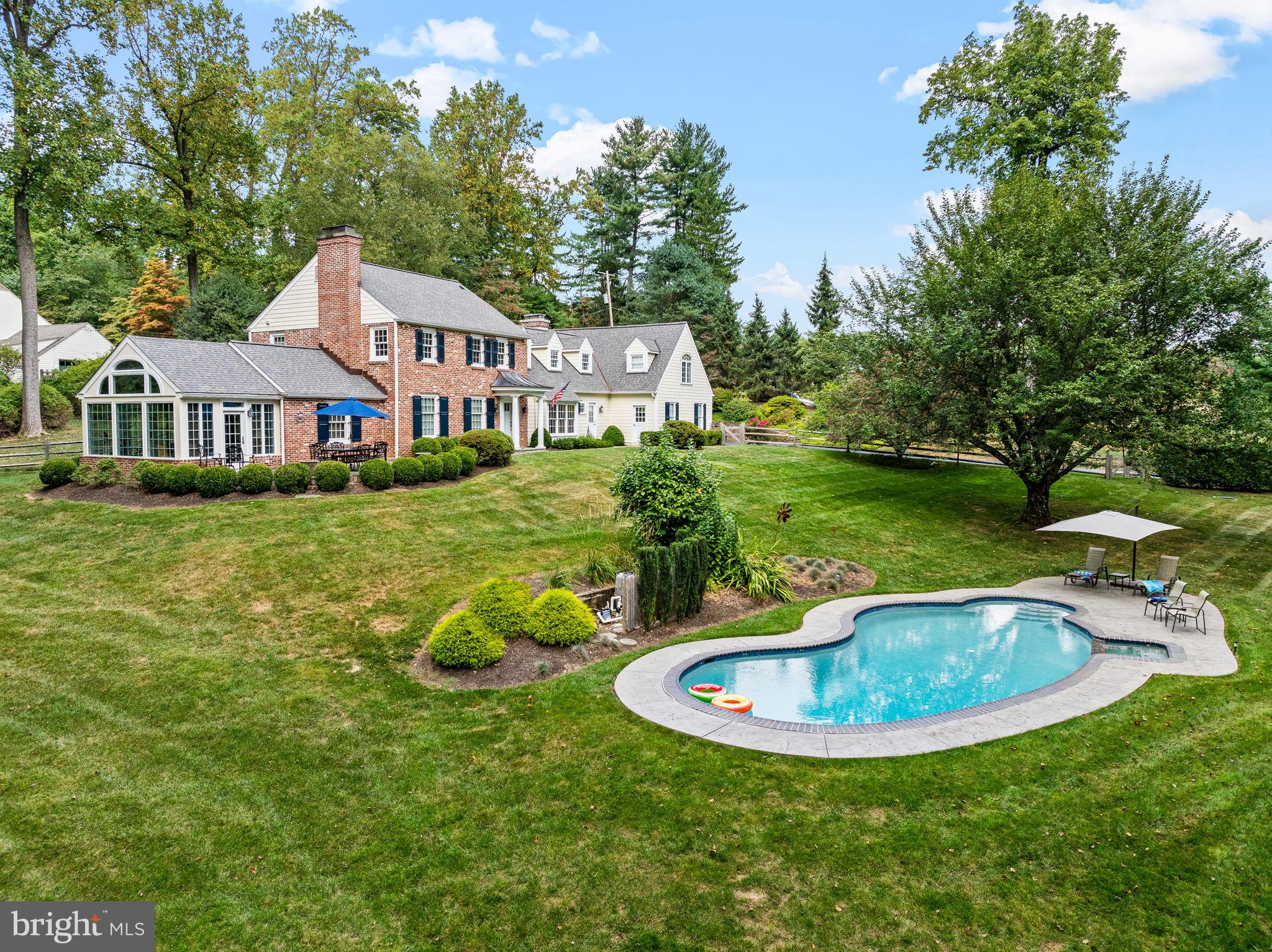 182 Grubb Road Malvern, PA 19355 - Photo 12 of 69 a view of a white house with a sink and a yard