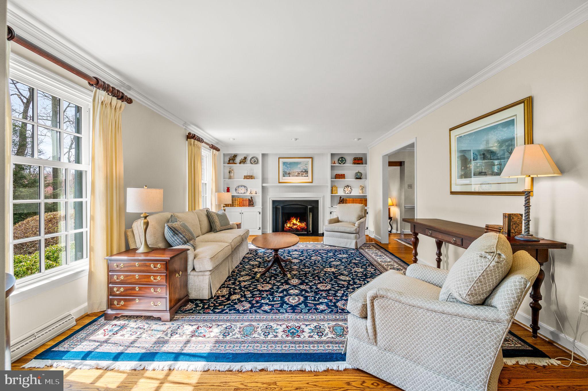 182 Grubb Road Malvern, PA 19355 - Photo 16 of 69 a living room with furniture large window and a fireplace
