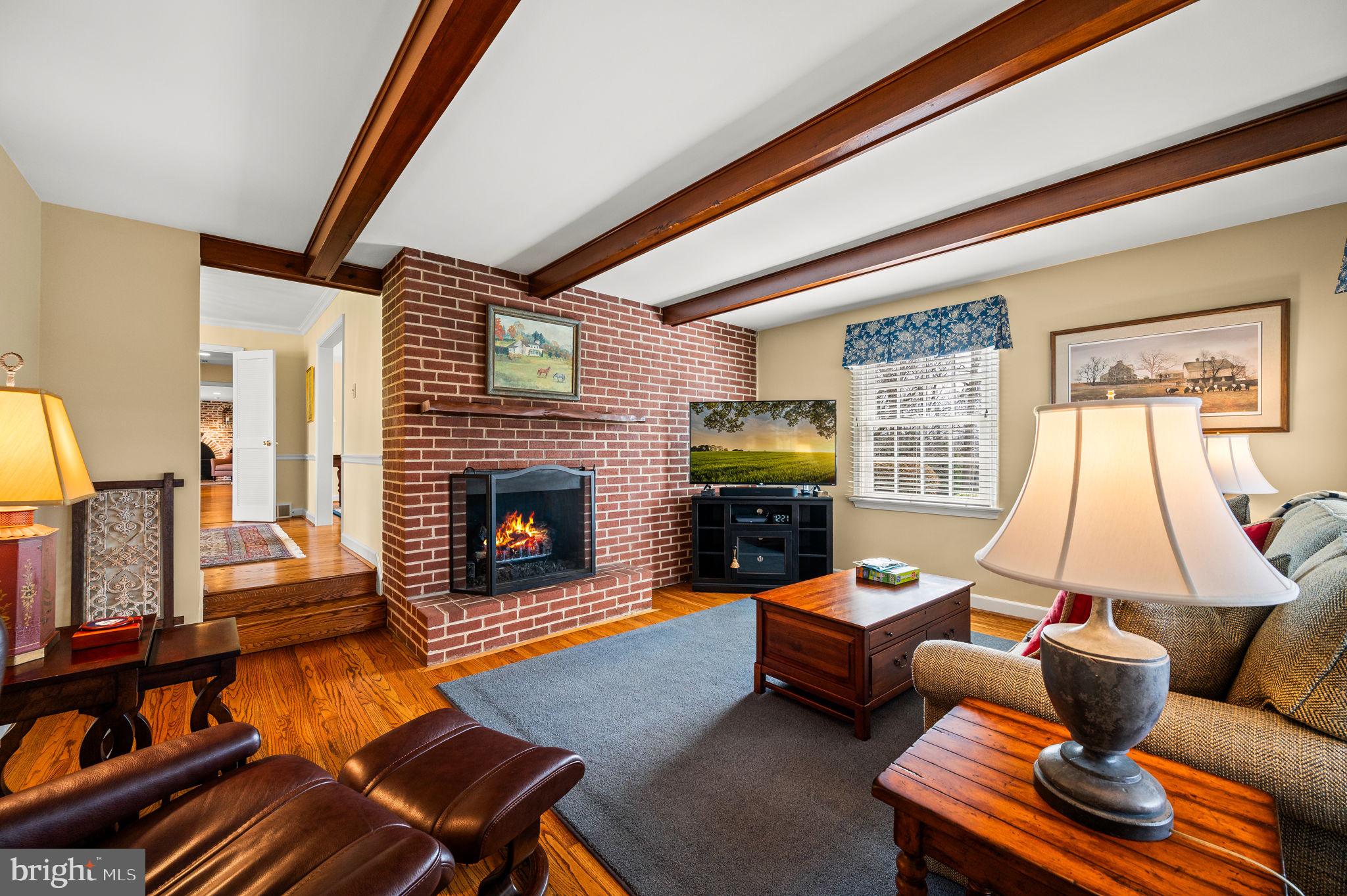 182 Grubb Road Malvern, PA 19355 - Photo 24 of 69 a living room with furniture and a fireplace