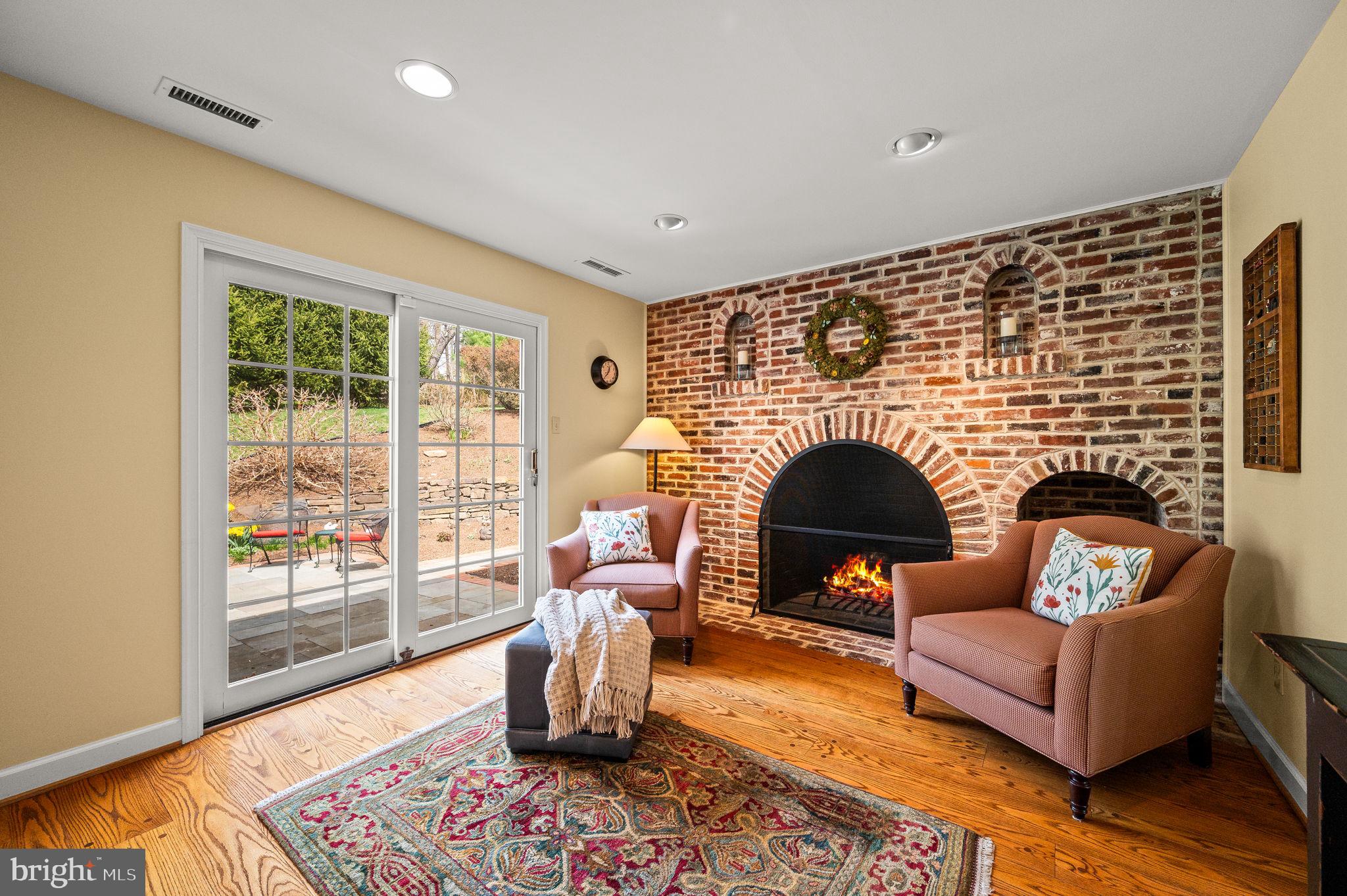 182 Grubb Road Malvern, PA 19355 - Photo 31 of 69 a living room with furniture and a fireplace