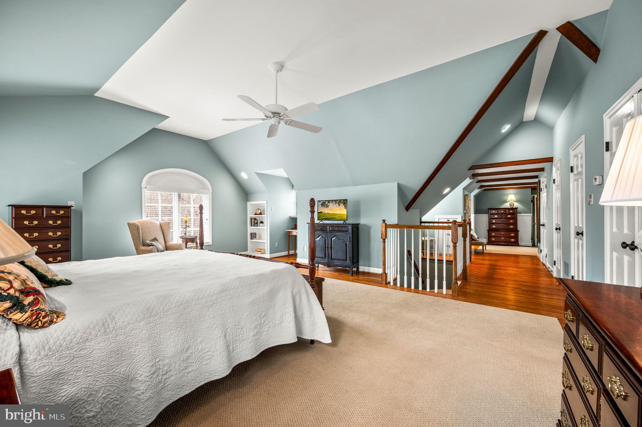 182 Grubb Road Malvern, PA 19355 - Photo 35 of 69 a bedroom with a large bed and a chandelier