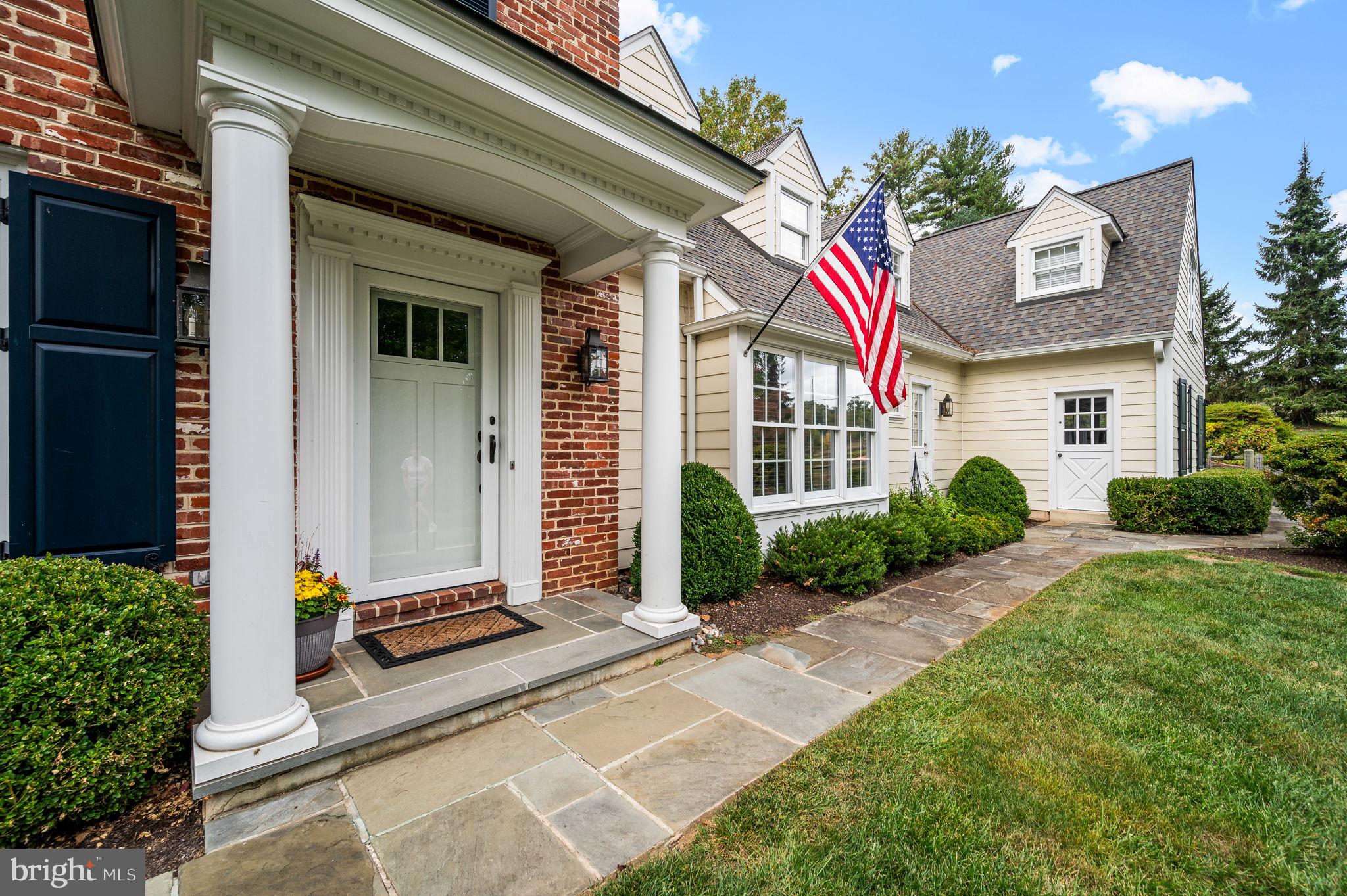 182 Grubb Road Malvern, PA 19355 - Photo 4 of 69 a front view of a house with garden