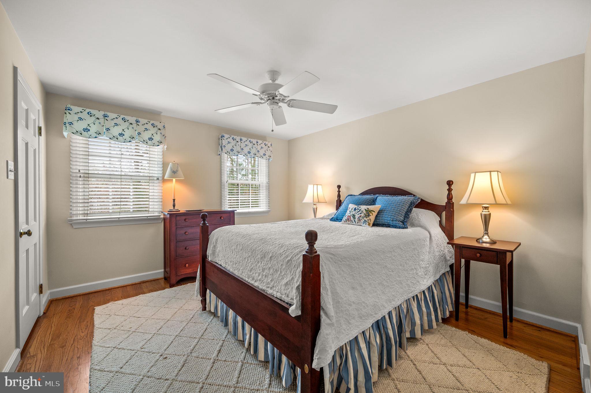 182 Grubb Road Malvern, PA 19355 - Photo 47 of 69 a bedroom with a bed a chandelier and dresser