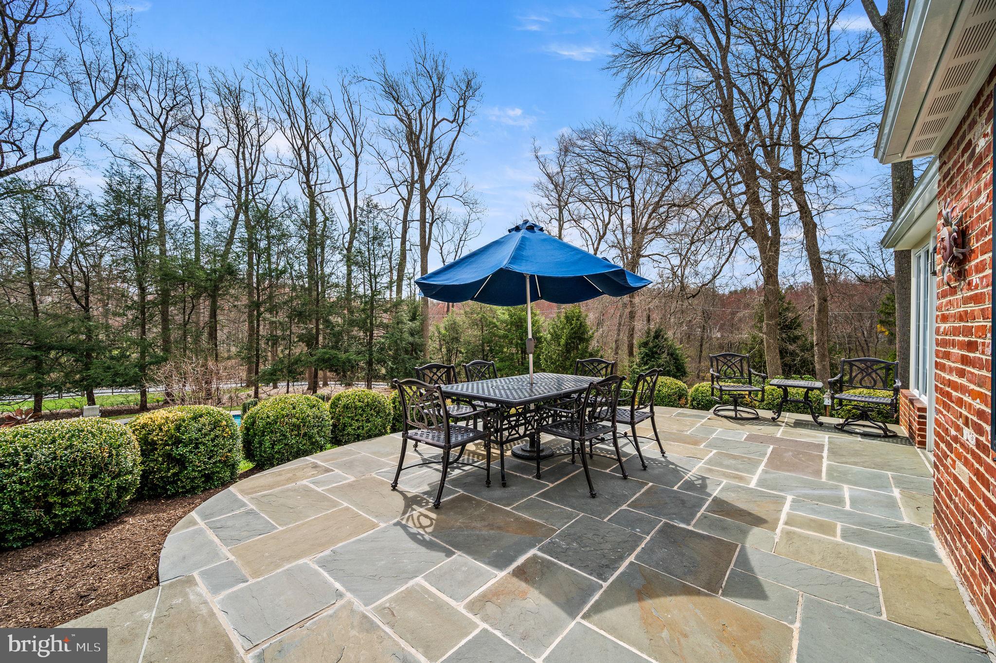 182 Grubb Road Malvern, PA 19355 - Photo 54 of 69 a patio with a patio table and chairs