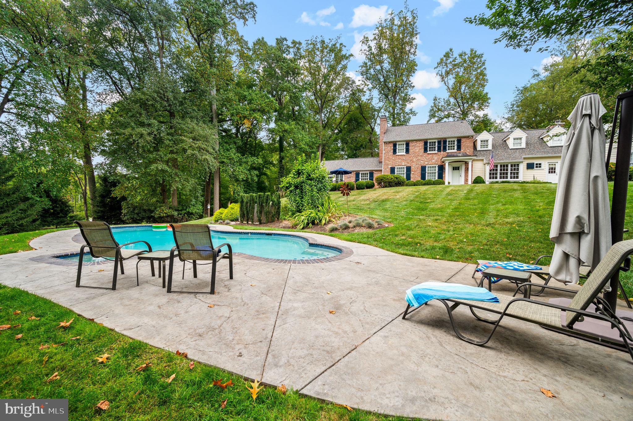 182 Grubb Road Malvern, PA 19355 - Photo 62 of 69 a view of a patio with a table and chairs