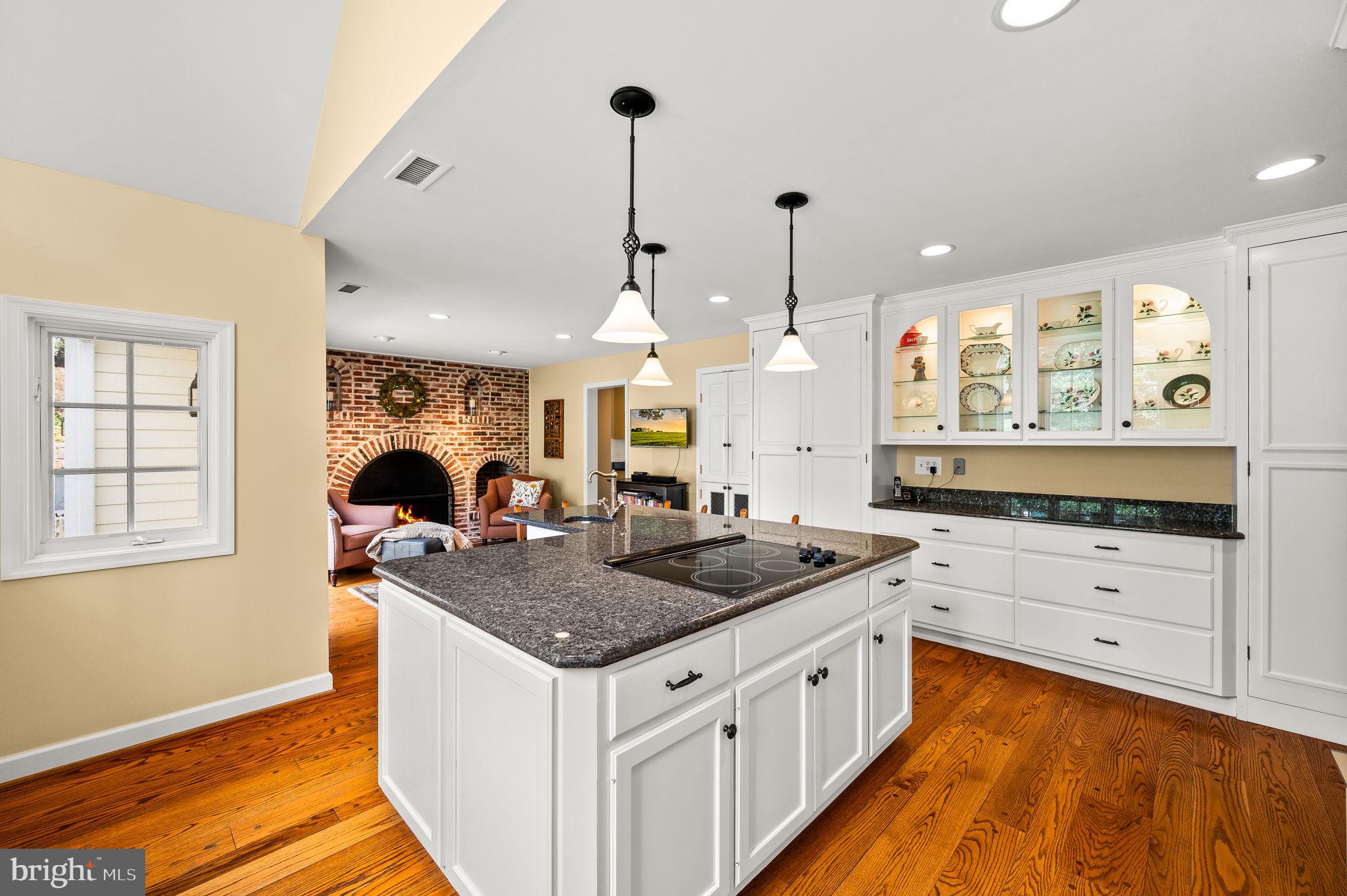 182 Grubb Road Malvern, PA 19355 - Photo 8 of 69 a kitchen with stainless steel appliances granite countertop a stove a sink and a refrigerator