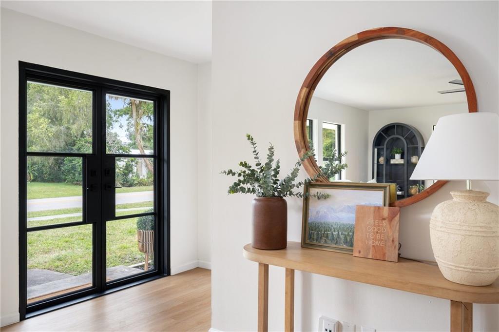 2575 15th Street Vero Beach, FL 32960 - Photo 15 of 36 a view of entryway with wooden floor