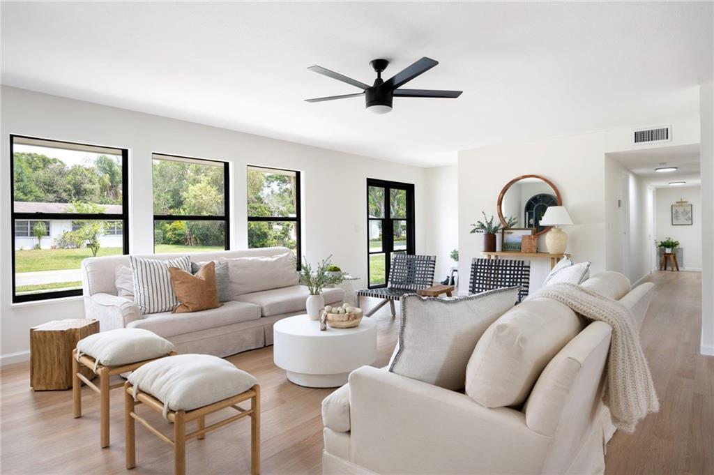 2575 15th Street Vero Beach, FL 32960 - Photo 21 of 36 a living room with furniture and a large window