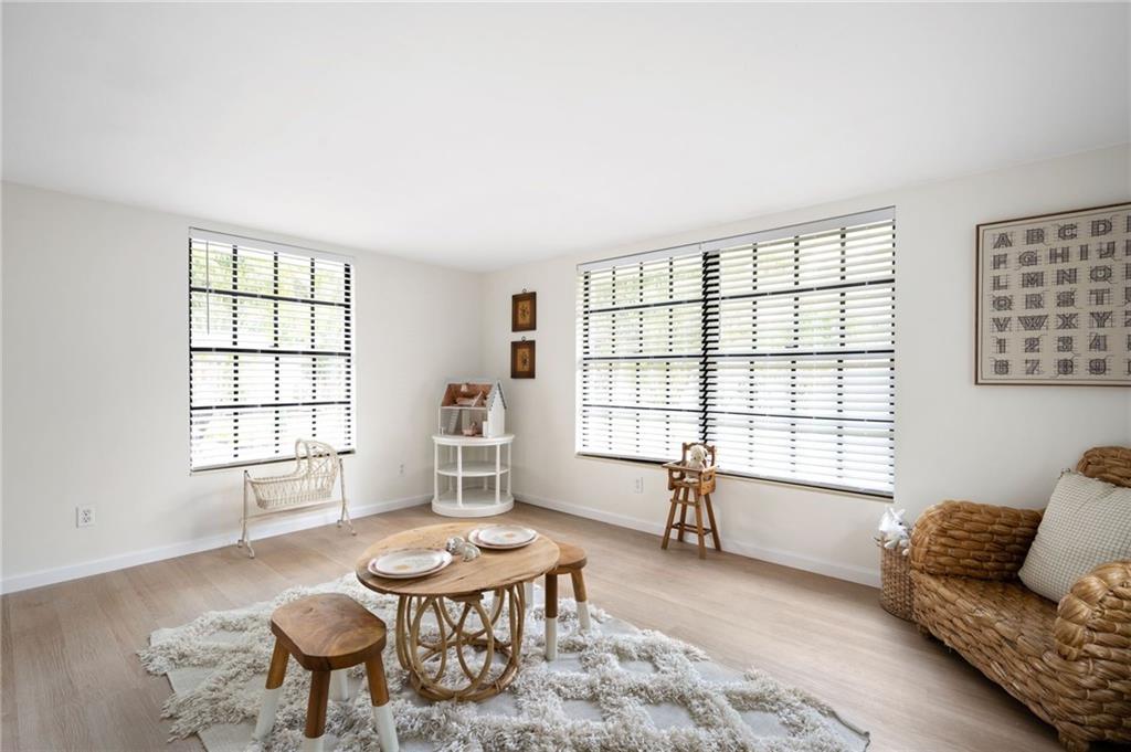 2575 15th Street Vero Beach, FL 32960 - Photo 24 of 36 a living room with furniture and a window