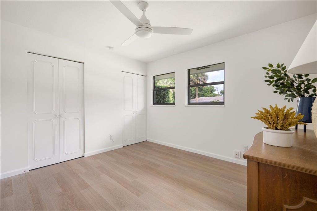 2575 15th Street Vero Beach, FL 32960 - Photo 29 of 36 a view of an empty room with a potted plant