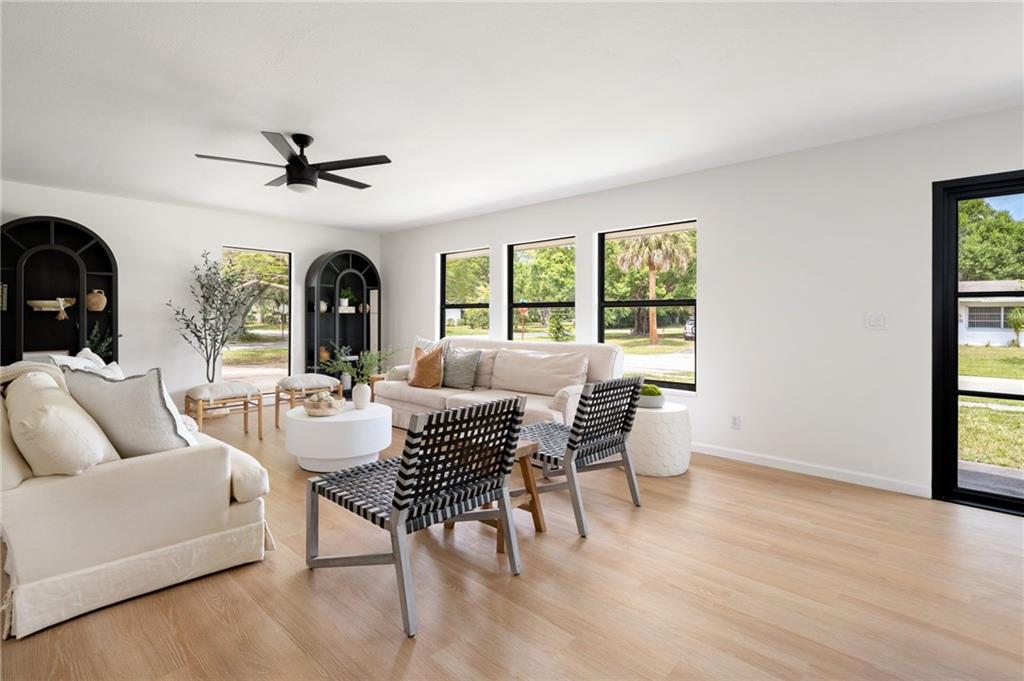 2575 15th Street Vero Beach, FL 32960 - Photo 33 of 36 a living room with furniture and a large window