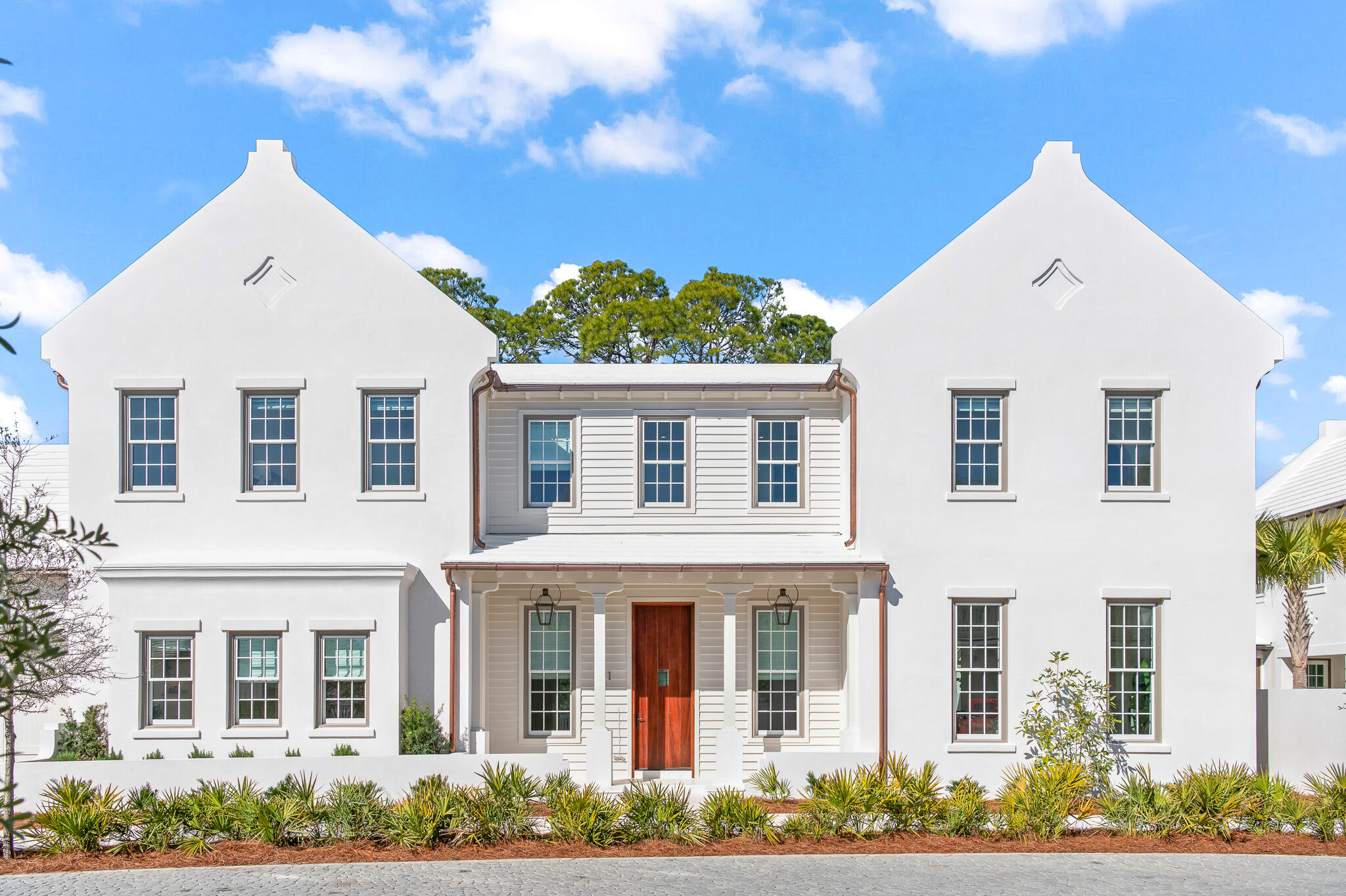 front view of a house with a yard
