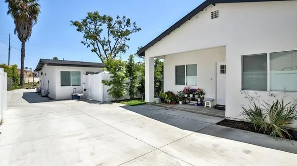 a house view with a garden space