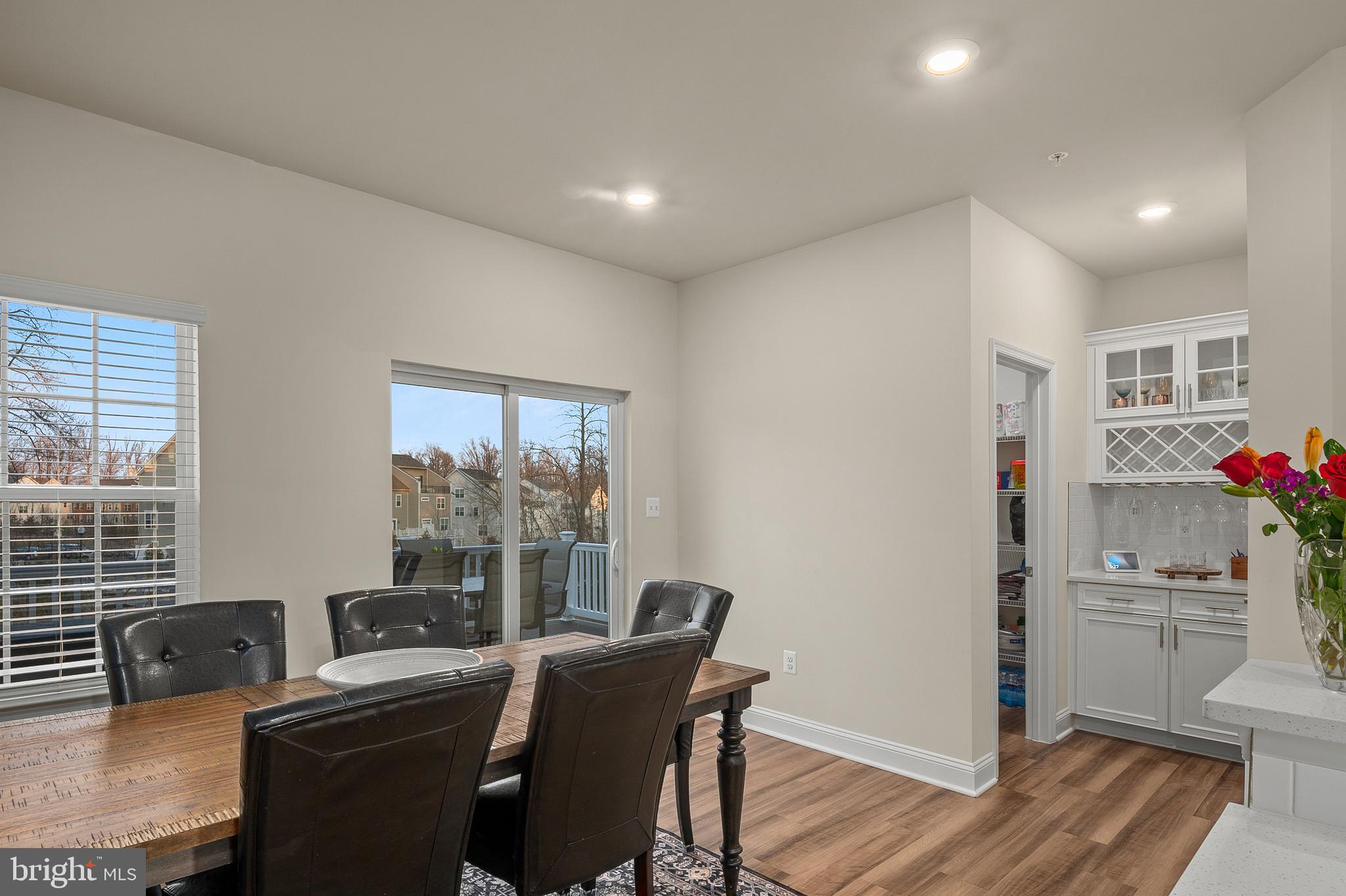 1021 Bluebells Road Gambrills, MD 21054 - Photo 14 of 52 Level 2: Dining to Bar and Walk in Pantry