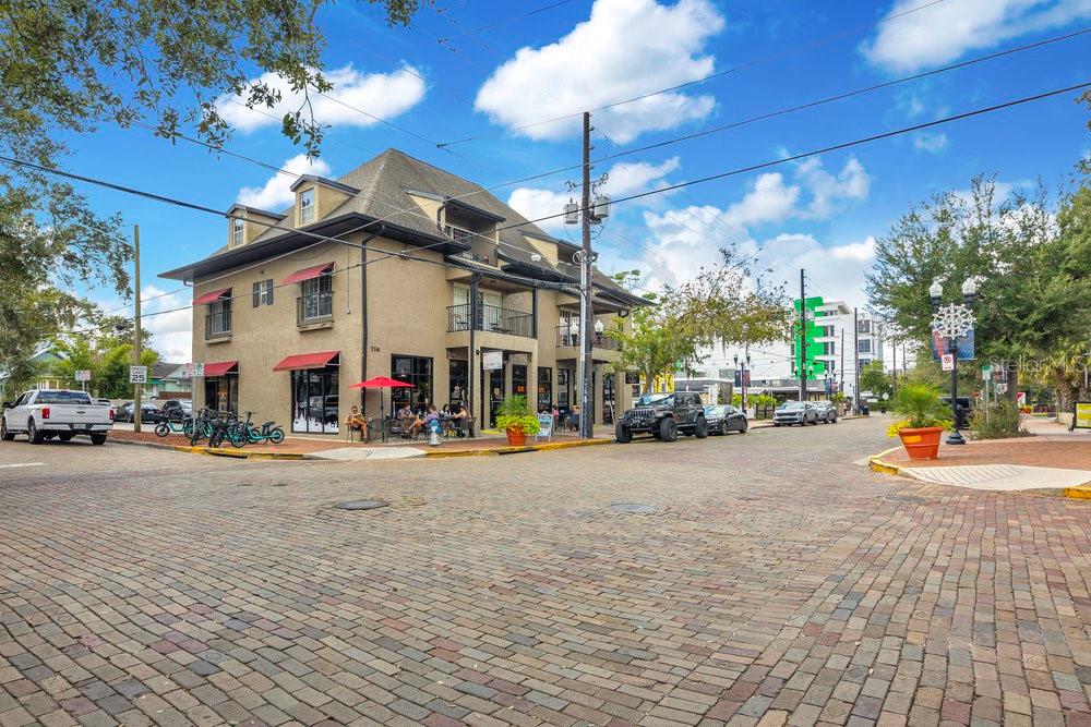 1008 East Robinson Street Orlando, FL 32801 - Photo 23 of 40 a view of a street with cars parked