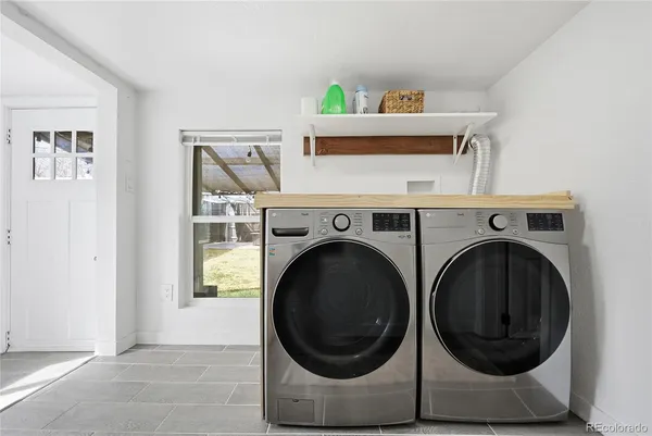 a utility room with dryer and washer