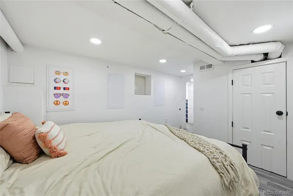 a bathroom with a toilet sink and shower