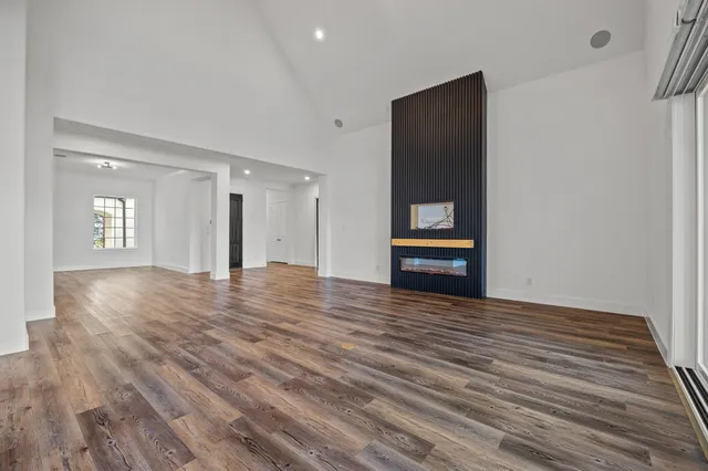 a bathroom with a bath tub with a shower
