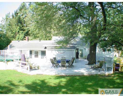 397 Chain O' Hills Road Colonia, NJ 07067 - Photo 10 of 10 a view of a house with backyard porch and sitting area