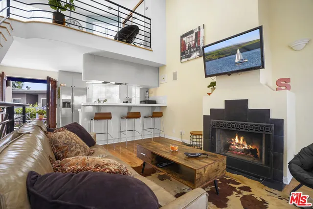 a view of balcony with furniture