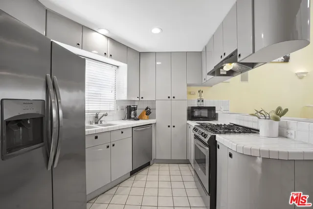 a view of a workspace with a couch