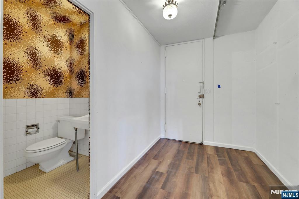 5 Horizon Road, Unit 503 Fort Lee, NJ 07024 - Photo 20 of 45 a bathroom with a toilet and a shower