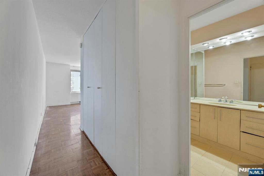 5 Horizon Road, Unit 503 Fort Lee, NJ 07024 - Photo 23 of 45 a view of a bathroom from the hallway