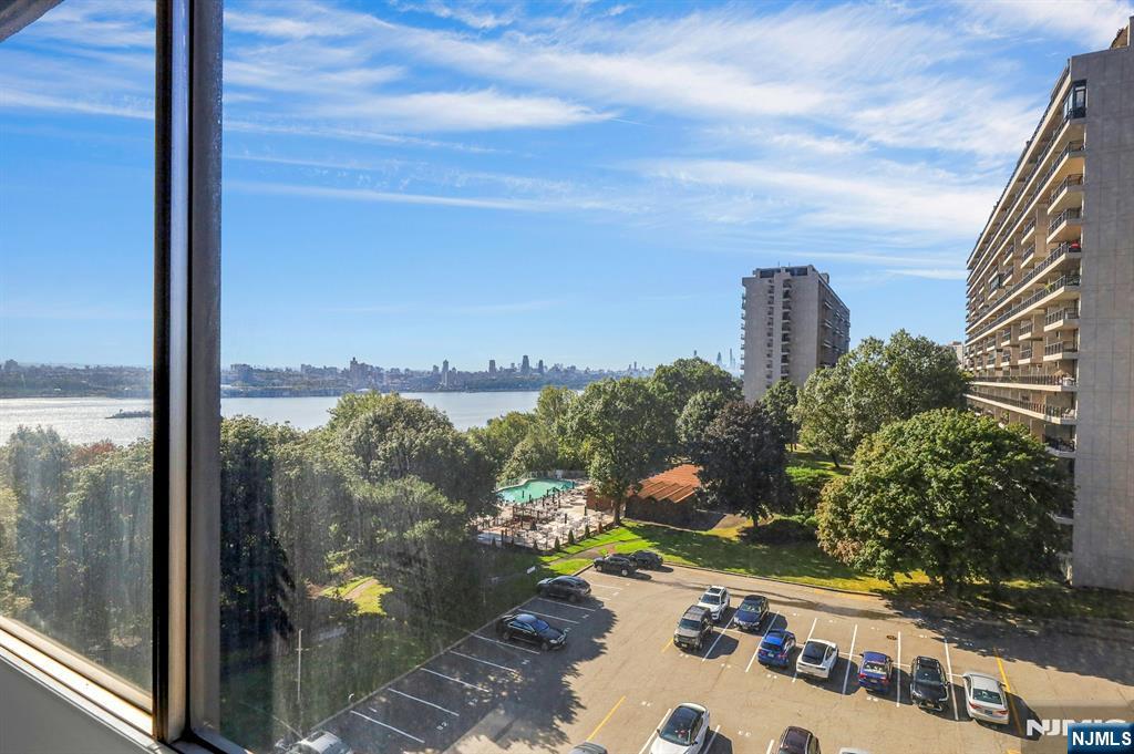 5 Horizon Road, Unit 503 Fort Lee, NJ 07024 - Photo 4 of 45 a view of a city from a balcony