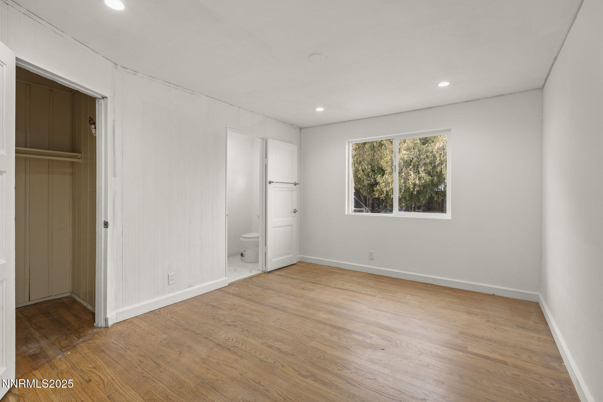 1085 Memory Lane Reno, NV 89509 - Photo 14 of 21 an empty room with windows and closet