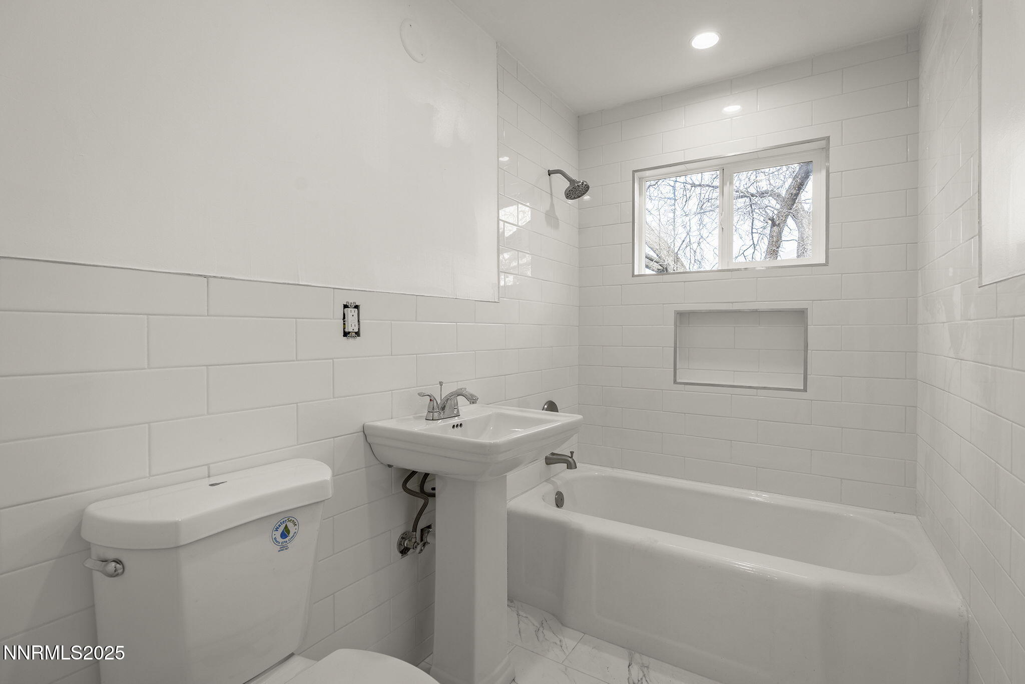1085 Memory Lane Reno, NV 89509 - Photo 20 of 21 a white bath tub sitting next to a white toilet