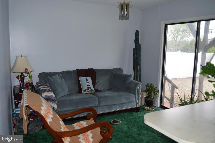 131 Club House Road Brick, NJ 08723 - Photo 12 of 20 a living room with furniture and a window