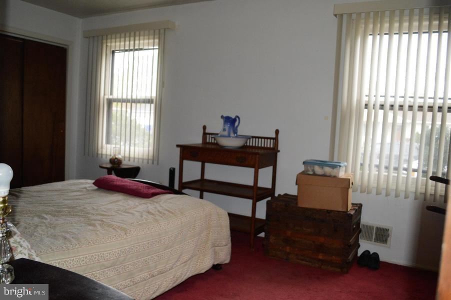 131 Club House Road Brick, NJ 08723 - Photo 17 of 20 a bedroom with bed and a window