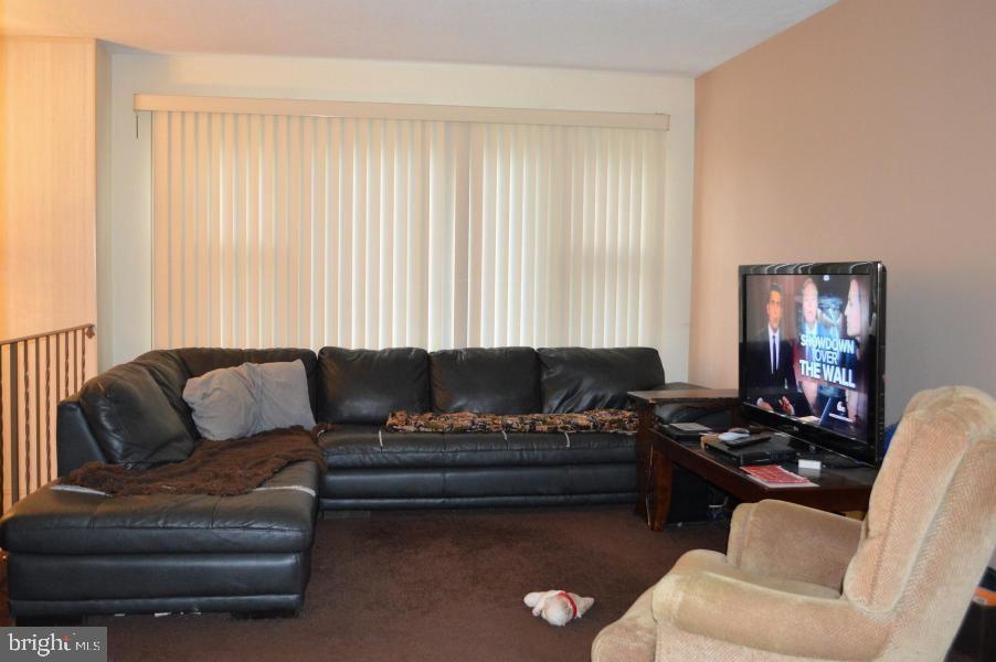 131 Club House Road Brick, NJ 08723 - Photo 6 of 20 a living room with furniture and a potted plant