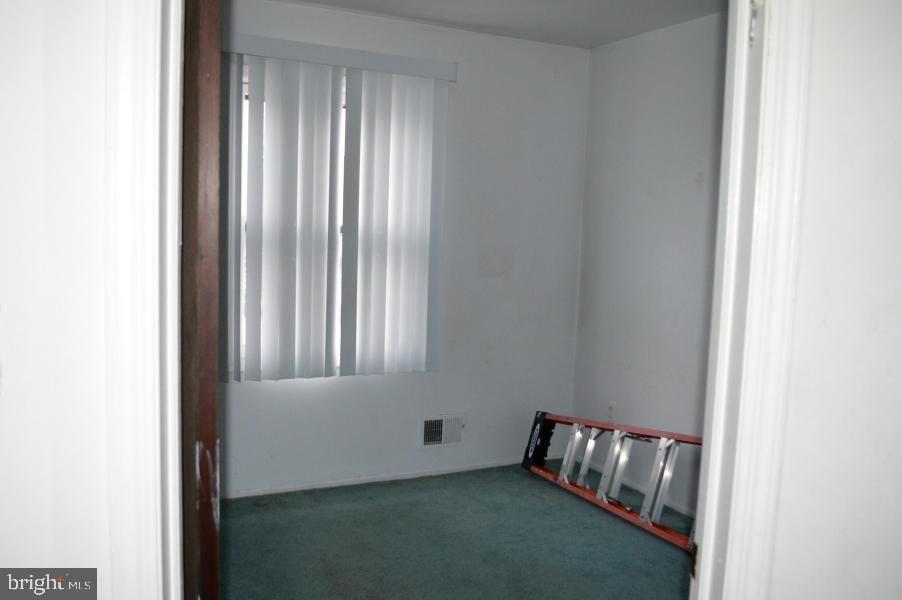131 Club House Road Brick, NJ 08723 - Photo 9 of 20 a room with a window